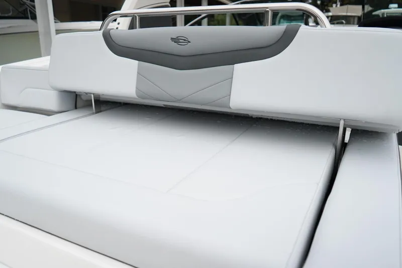 Slide: The Image of 2026 Chaparral 270 OSX boat with sleek white and gray seating design. - 8