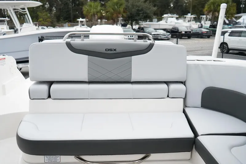 Slide: The Image of 2026 Chaparral 270 OSX boat seating area with modern design and comfortable upholstery. - 9