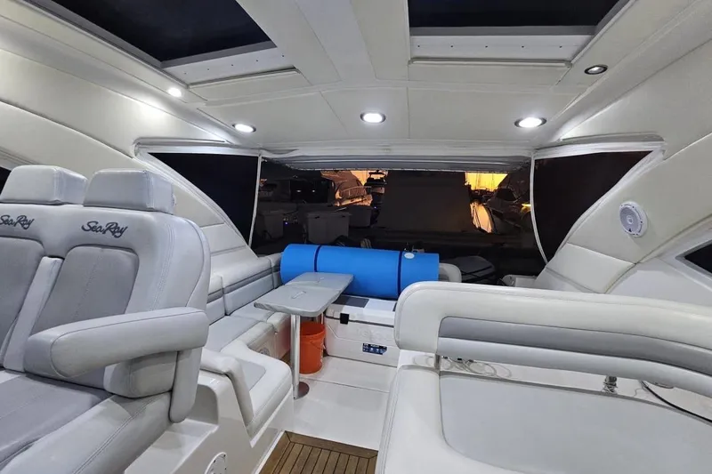 Slide: The Image of Luxurious interior of 2010 Sea Ray 470 Sundancer yacht with plush seating and modern design. - 11