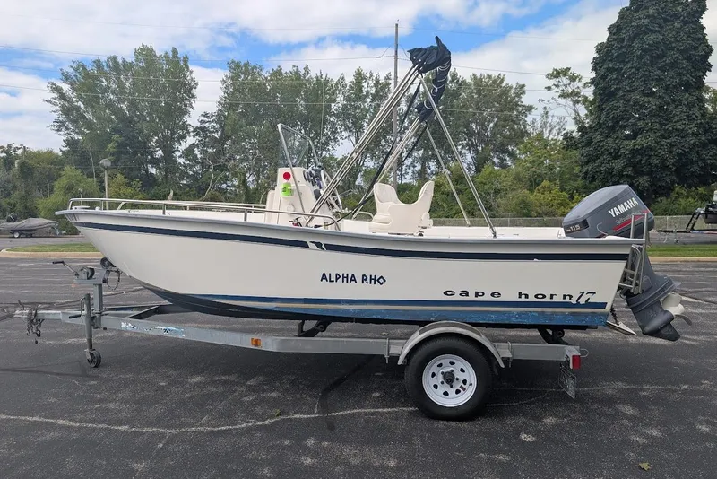 Slide: The Image of 1999 Cape Horn 17' Center Console boat on trailer, featuring Yamaha outboard motor. - 8
