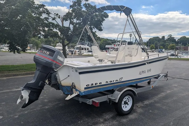 Slide: The Image of 1999 Cape Horn 17' Center Console boat on trailer with Yamaha outboard motor. - 2