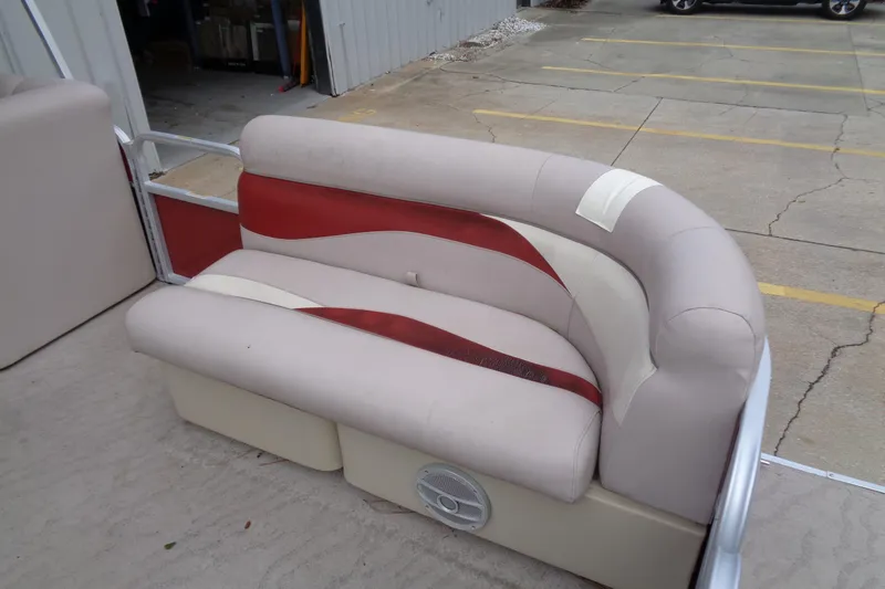 Slide: The Image of 2014 Sweetwater 2086 DFS boat seat with red and beige upholstery. - 5