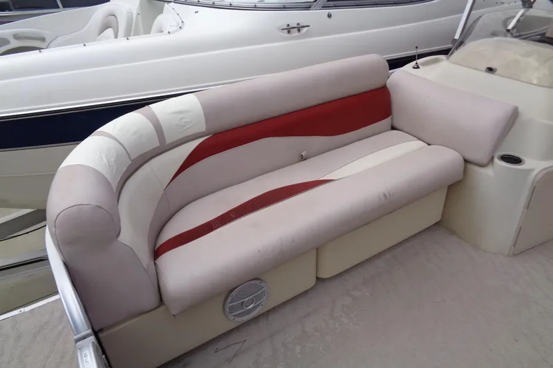 Slide: The Image of 2014 Sweetwater 2086 DFS boat seating with red and beige upholstery. - 6