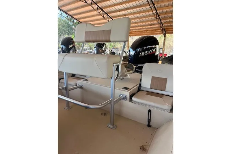 Slide: The Image of 2024 G3 Bay 20 GX boat interior with beige seating and metal frame. - 6