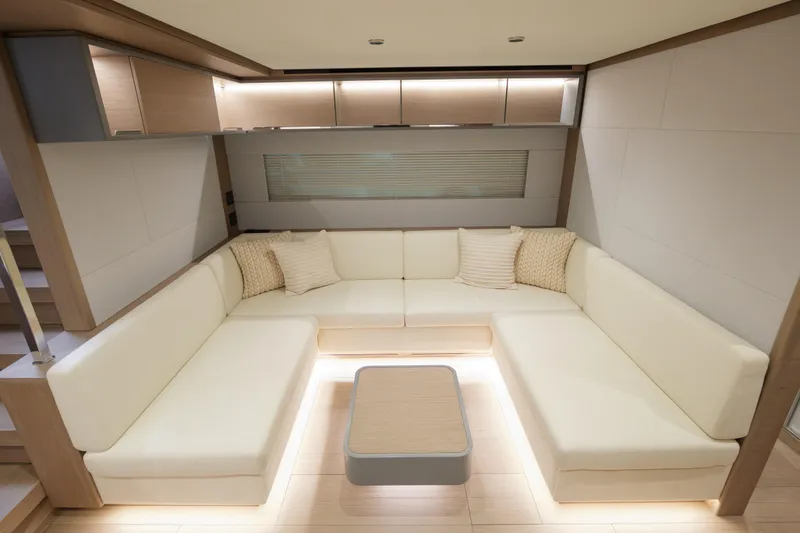 Slide: The Image of Luxurious 2027 Pardo Yachts GT75 cruising with city skyline in the background. - 13