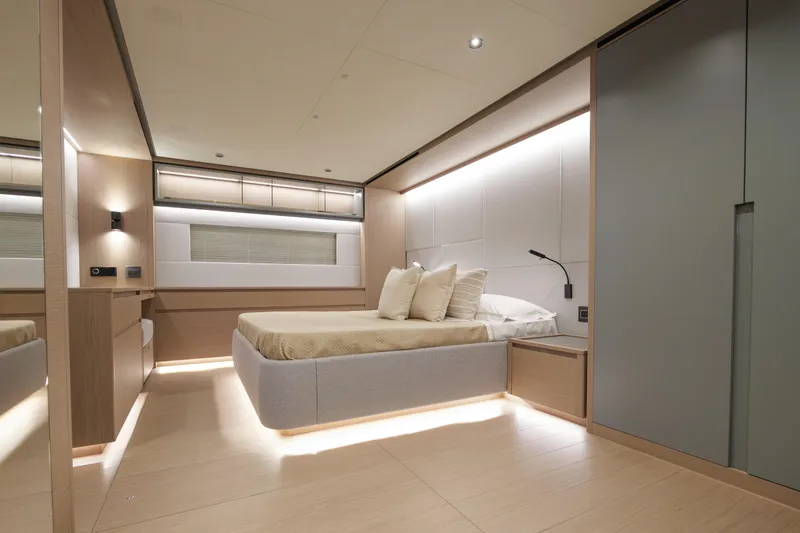 Slide: The Image of Luxurious 2027 Pardo Yachts GT75 with elegant outdoor seating and scenic waterfront view. - 15