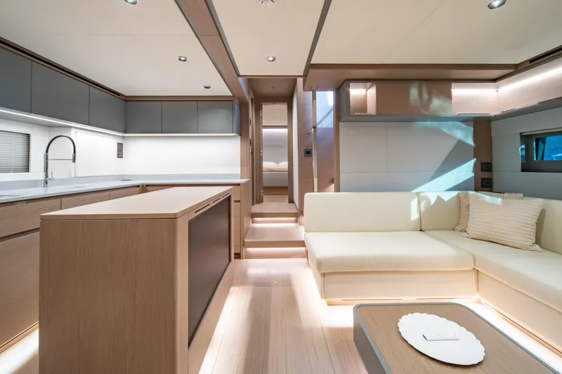 Slide: The Image of Luxurious interior of 2027 Pardo Yachts GT75, featuring modern kitchen and elegant seating area. - 52
