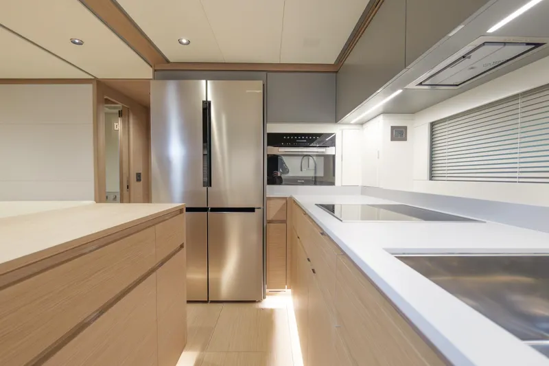 Slide: The Image of Luxury Pardo Yachts GT75, 2027 model, docked with elegant design and spacious deck. - 12