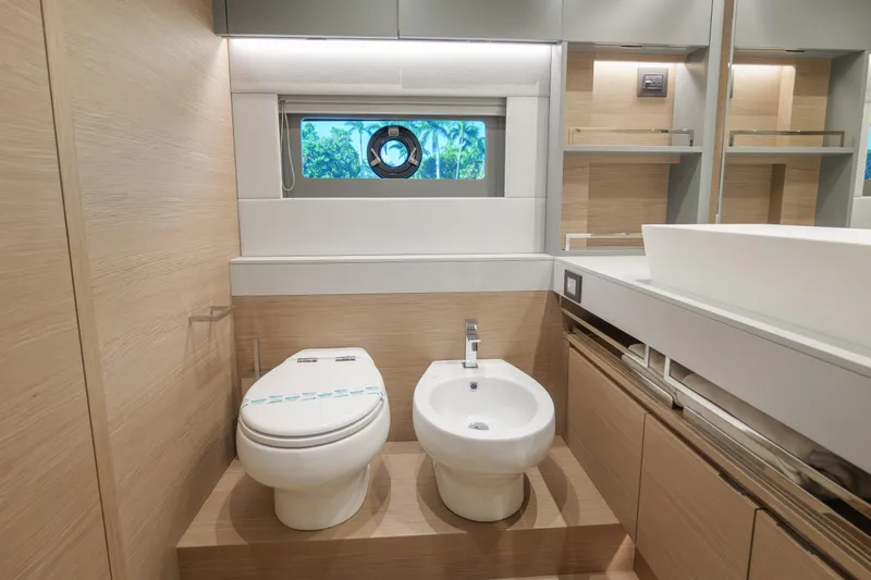 Slide: The Image of 2027 Pardo Yachts GT75 cockpit with advanced navigation displays and waterfront view. - 25