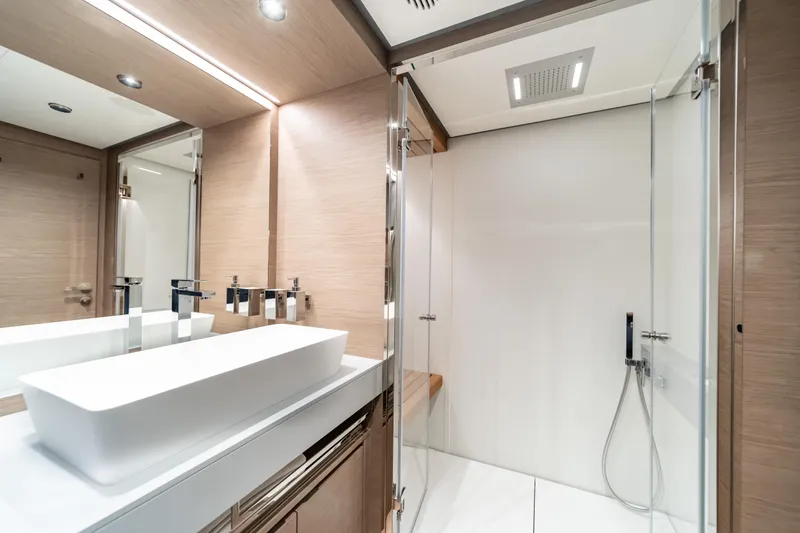 Slide: The Image of Luxurious bathroom in 2027 Pardo Yachts GT75, featuring modern fixtures and elegant design. - 48