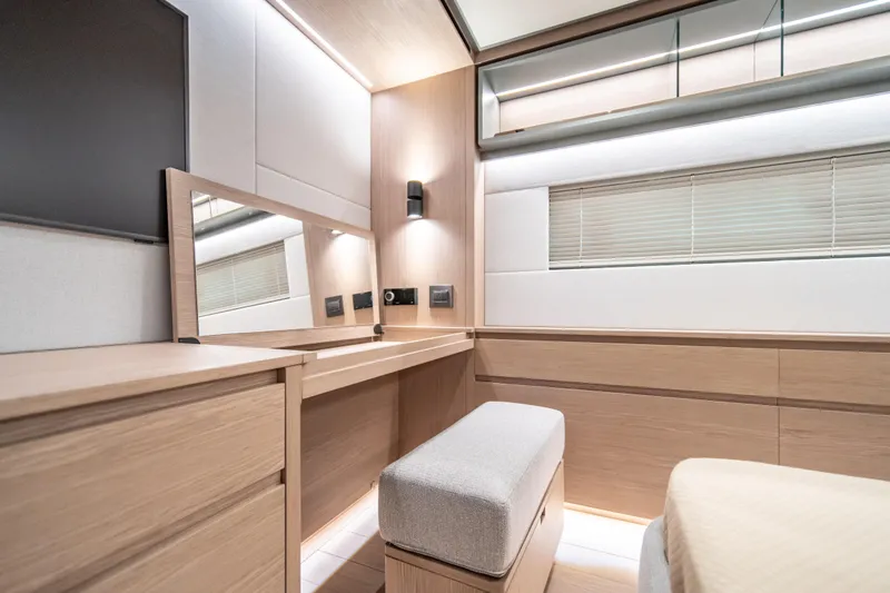 Slide: The Image of Luxurious interior of 2027 Pardo Yachts GT75 with modern wood finish and elegant lighting. - 51