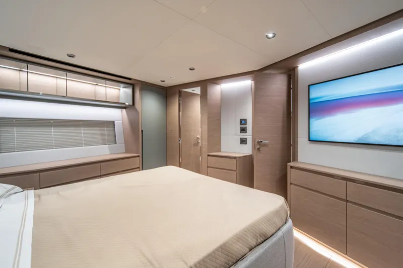 Slide: The Image of Luxurious interior of 2027 Pardo Yachts GT75, featuring modern bedroom design and ambient lighting. - 62