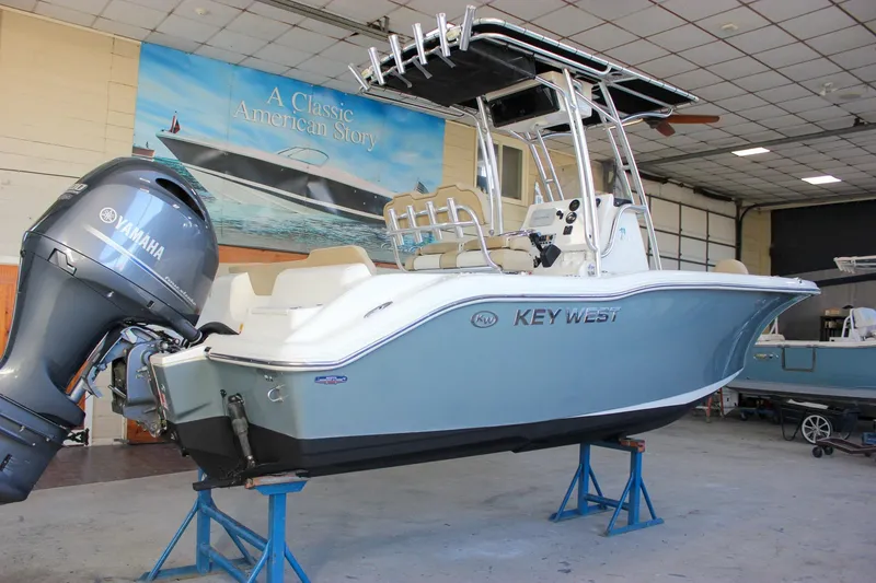 Slide: The Image of 2018 Key West 219 FS boat with Yamaha engine in indoor showroom. - 60