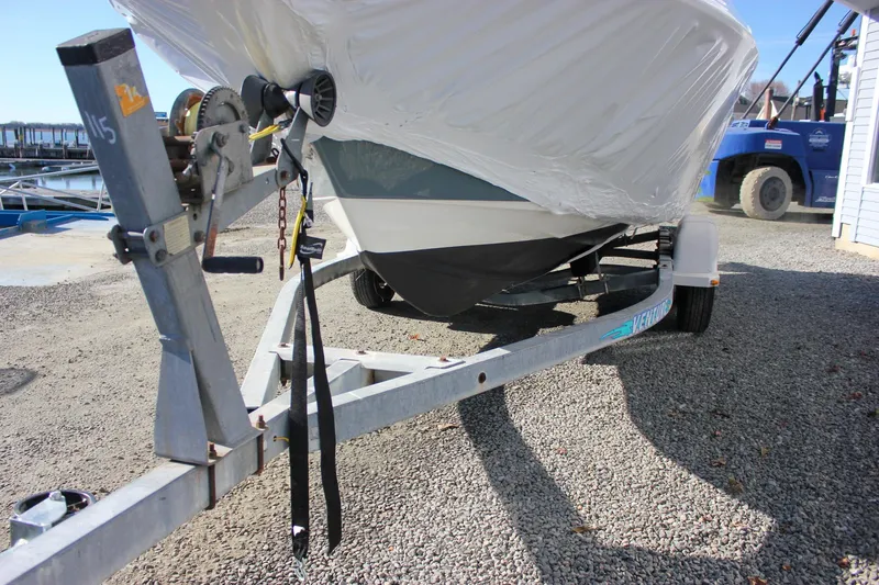 Slide: The Image of 2018 Key West 219 FS boat on trailer, wrapped for transport. - 63