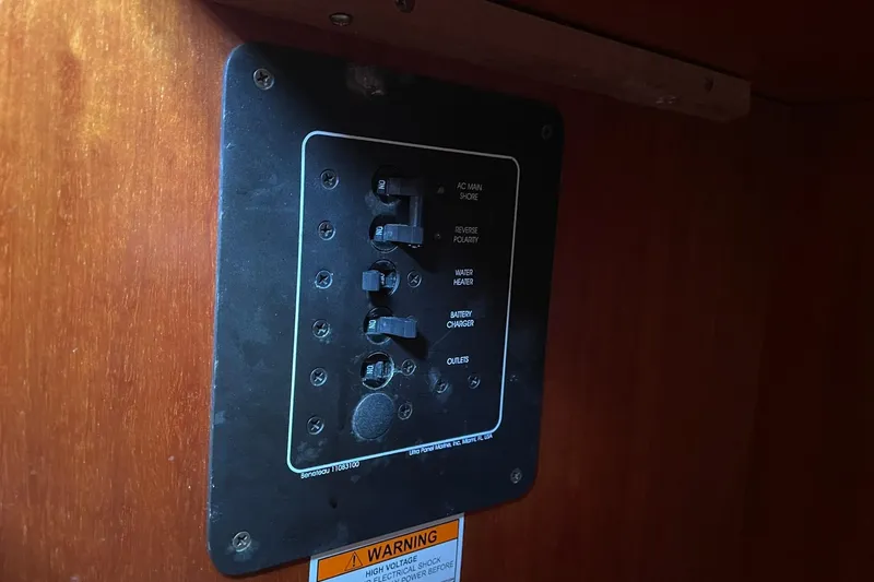 Slide: The Image of Electrical panel on a 2000 Beneteau Oceanis 361 sailboat interior. - 18
