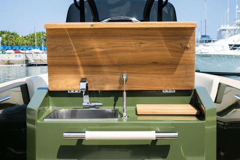 Slide: The Image of Lilybaeum Levanzo 25 Lounge Deck 2026 boat with outdoor sink and wooden countertop. - 10