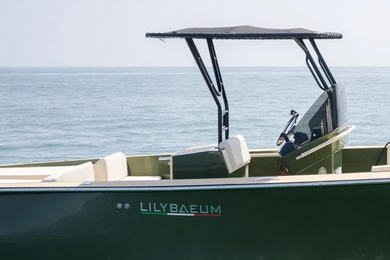 Slide: The Image of 2026 Lilybaeum Levanzo 25 Lounge Deck boat on calm sea. - 4