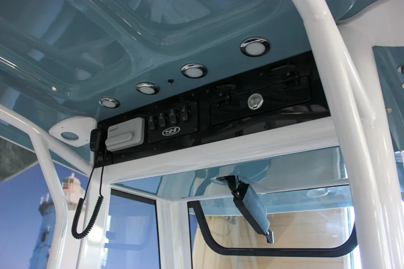 Slide: The Image of 2025 Sea Hunt Ultra 239 SE boat console with electronics and controls. - 39