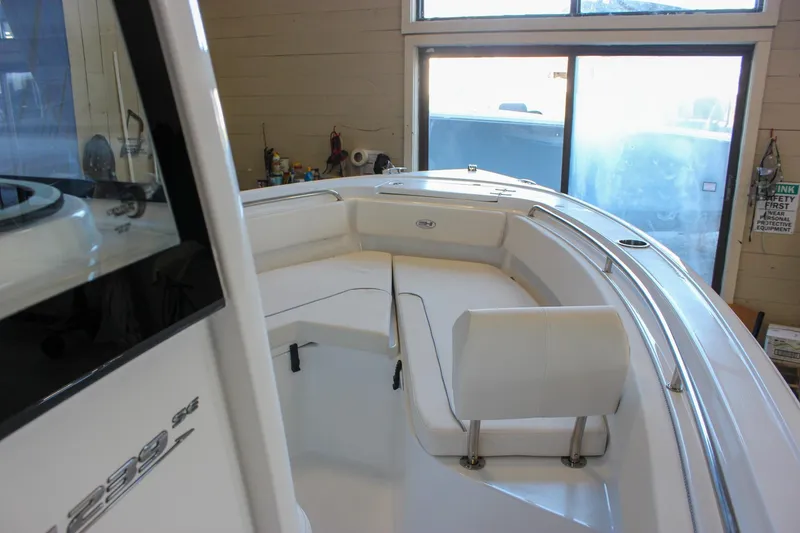 Slide: The Image of 2025 Sea Hunt Ultra 239 SE boat interior with seating and sleek design. - 46