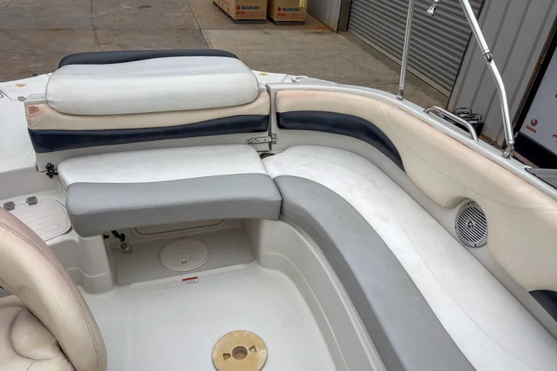 Slide: The Image of 2012 Tahoe 216 WT boat interior with cushioned seating and speaker. - 4
