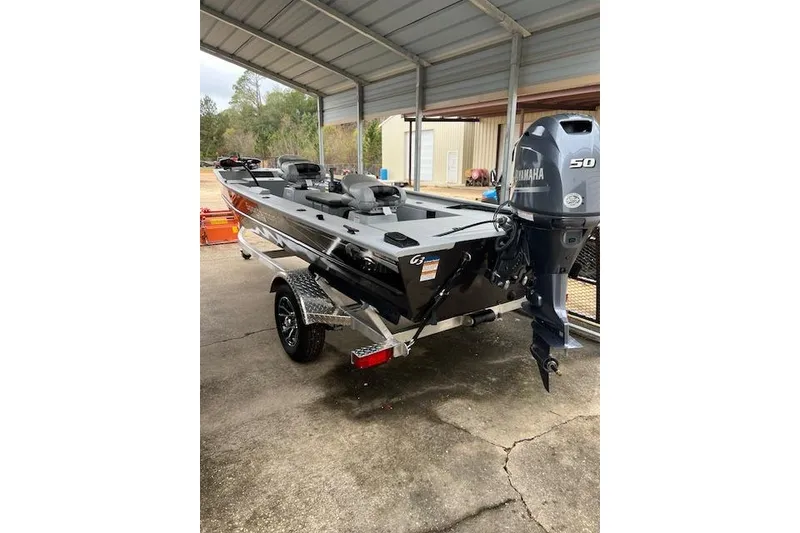 Slide: The Image of 2025 G3 Sportsman 16 SS boat with Yamaha 50 engine under a metal canopy. - 5