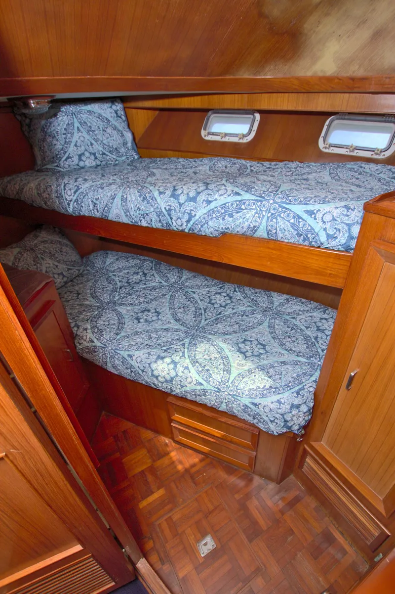 Slide: The Image of 1987 Jefferson 42 Sundeck cabin with wooden interior and bunk beds. - 39