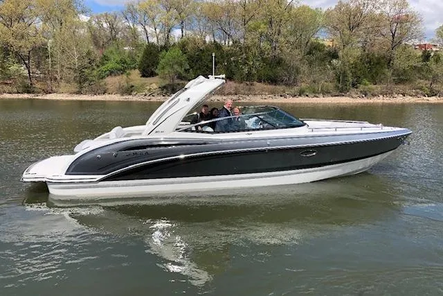 The Image of 2019 Formula 310 Bowrider I/O cruising on a calm river. - 1