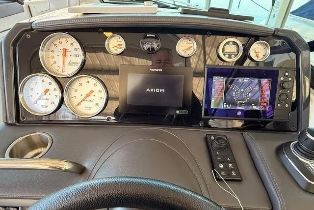 Slide: The Image of Dashboard of a 2019 Formula 310 Bowrider I/O with modern gauges. - 14
