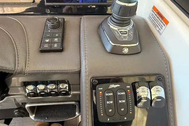 Slide: The Image of Control panel of 2019 Formula 310 Bowrider I/O with joystick and switches. - 15