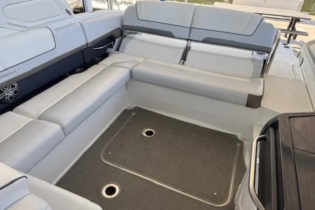 Slide: The Image of 2019 Formula 310 Bowrider I/O interior with spacious seating and modern design. - 18