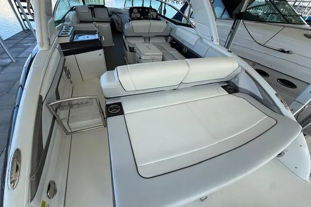 Slide: The Image of 2019 Formula 310 Bowrider I/O with spacious seating and sleek interior design. - 19