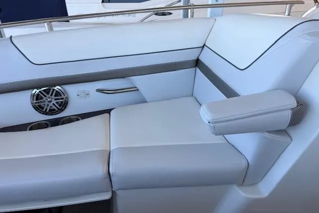 Slide: The Image of Luxurious seating on 2019 Formula 310 Bowrider I/O boat, featuring sleek white upholstery. - 6