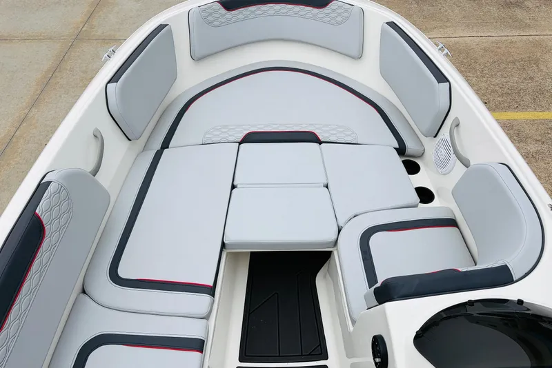 Slide: The Image of 2023 Bayliner Element M15 boat interior with cushioned seating and modern design. - 13
