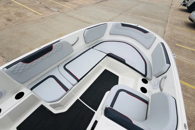 Slide: The Image of 2023 Bayliner Element M15 boat interior with stylish seating and cup holders. - 15