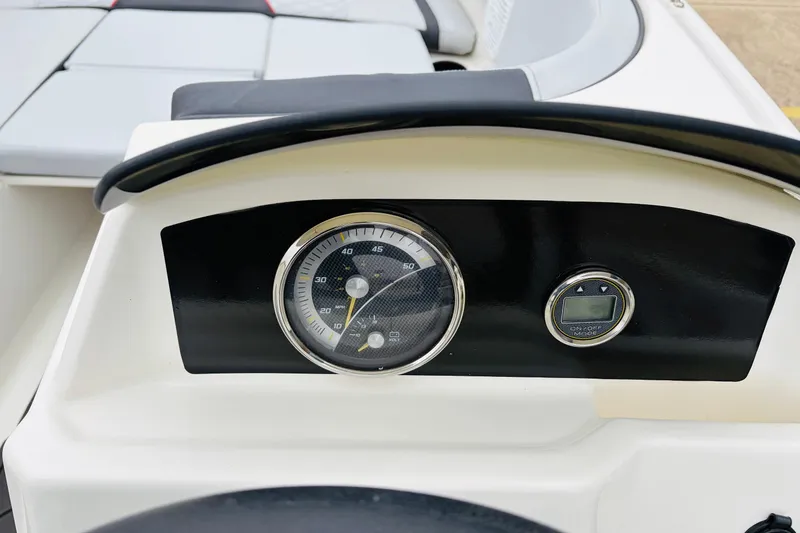 Slide: The Image of Dashboard of 2023 Bayliner Element M15 boat with speedometer and digital display. - 24