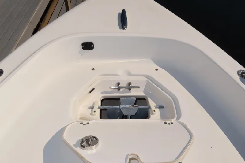Slide: The Image of 2018 Key West 1720 Center Console boat anchor compartment, white deck view. - 3