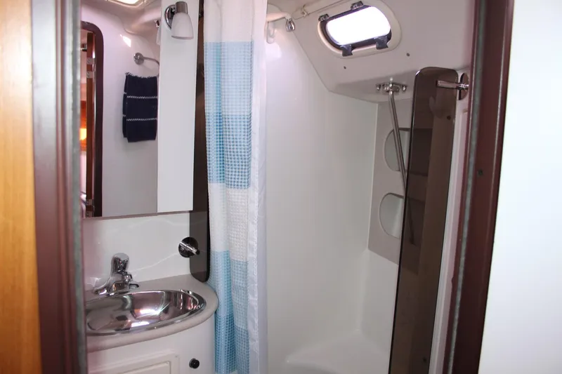 Slide: The Image of Bathroom interior of 2011 Catalina 445 yacht with shower and sink. - 11