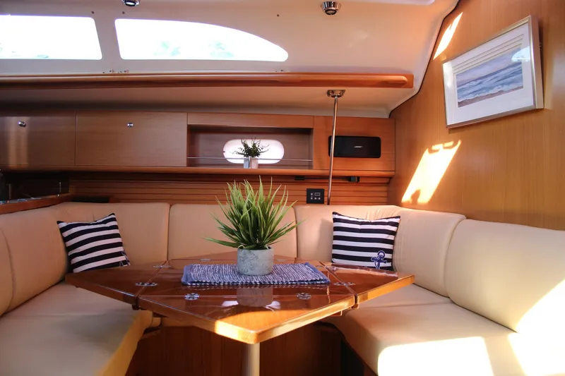 Slide: The Image of Interior of 2011 Catalina 445 yacht with cozy seating and elegant decor. - 3