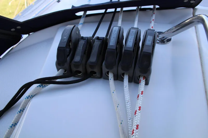 Slide: The Image of Close-up of Catalina 445 sailboat rope clutches, 2011 model, with multiple ropes secured. - 36
