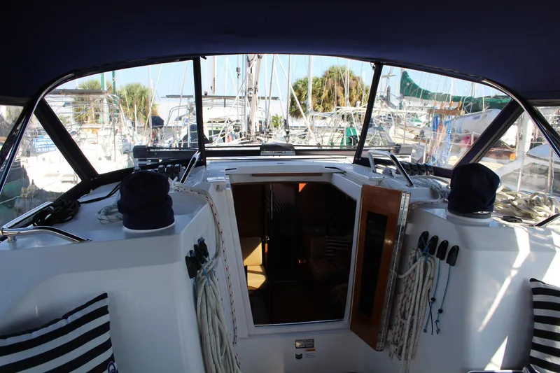 Slide: The Image of Cockpit view of 2011 Catalina 445 sailboat docked at marina. - 37