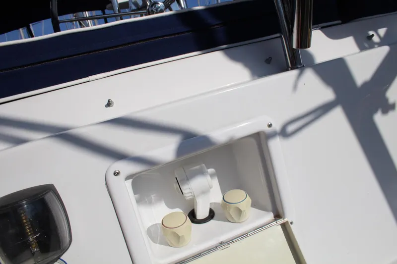 Slide: The Image of 2011 Catalina 445 yacht deck detail with fittings and shadows. - 45