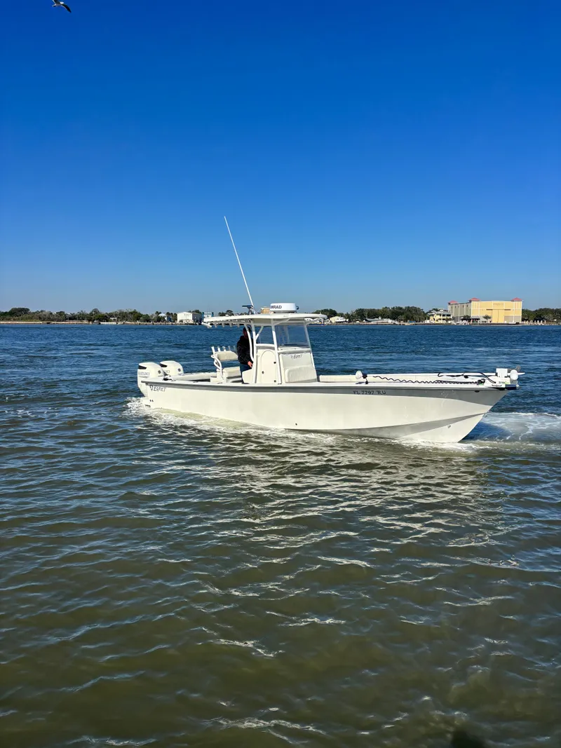 Slide: The Image of Egret 290 boat from 2019 on calm waters. - 1