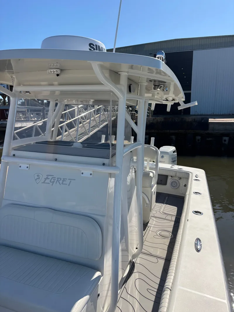 Slide: The Image of Egret 290 boat from 2019 docked, side view. - 11