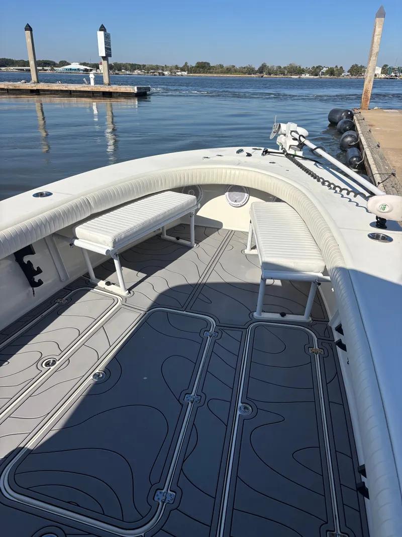 Slide: The Image of Egret 290 boat from 2019 docked with clear view of the deck. - 5