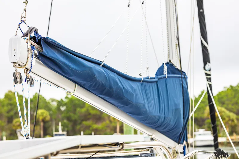Slide: The Image of Close-up of a 2014 Gemini Legacy 35 sailboat with blue sail cover. - 12