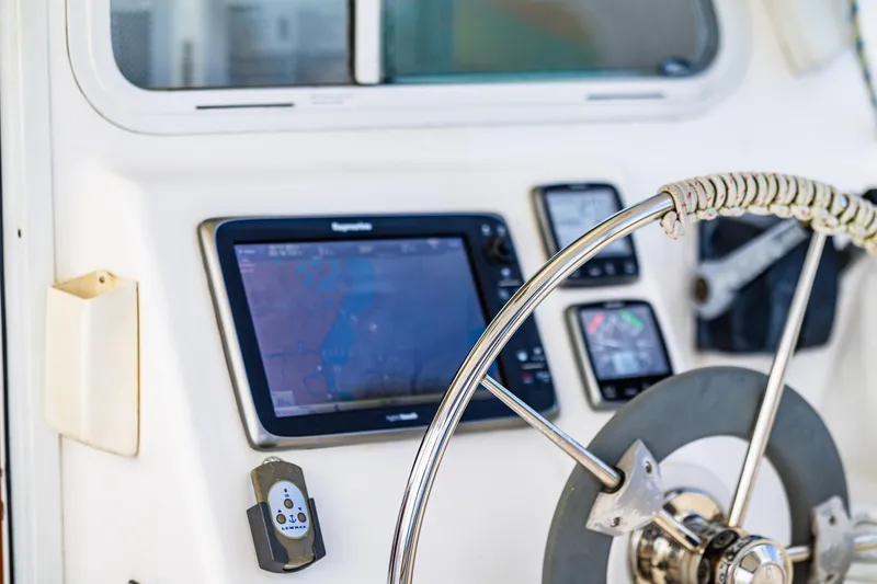 Slide: The Image of Steering wheel and navigation equipment on 2014 Gemini Legacy 35 sailboat. - 17