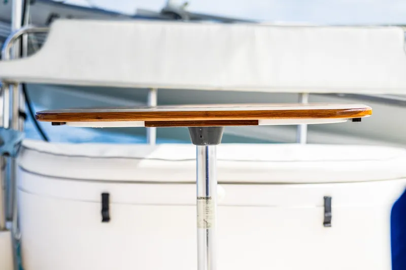 Slide: The Image of Wooden table on a 2014 Gemini Legacy 35 yacht deck. - 19