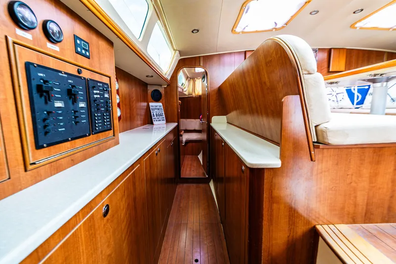 Slide: The Image of Interior of 2014 Gemini Legacy 35 yacht with wood paneling and control panel. - 28