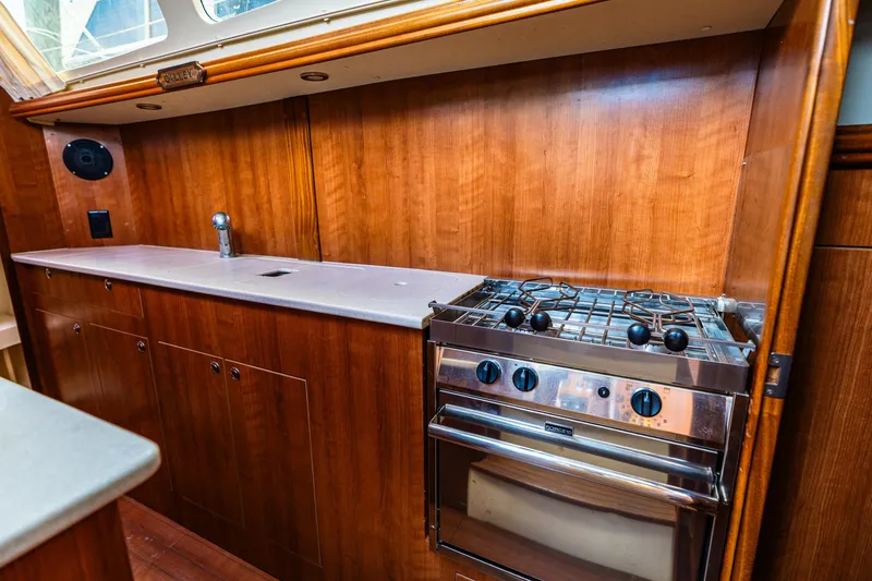 Slide: The Image of Galley kitchen in 2014 Gemini Legacy 35 yacht with stove and sink. - 31