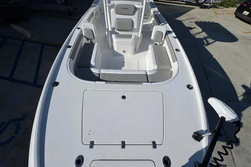 Slide: The Image of 2026 Caymas 26 HB boat deck with seating and storage compartments. - 22